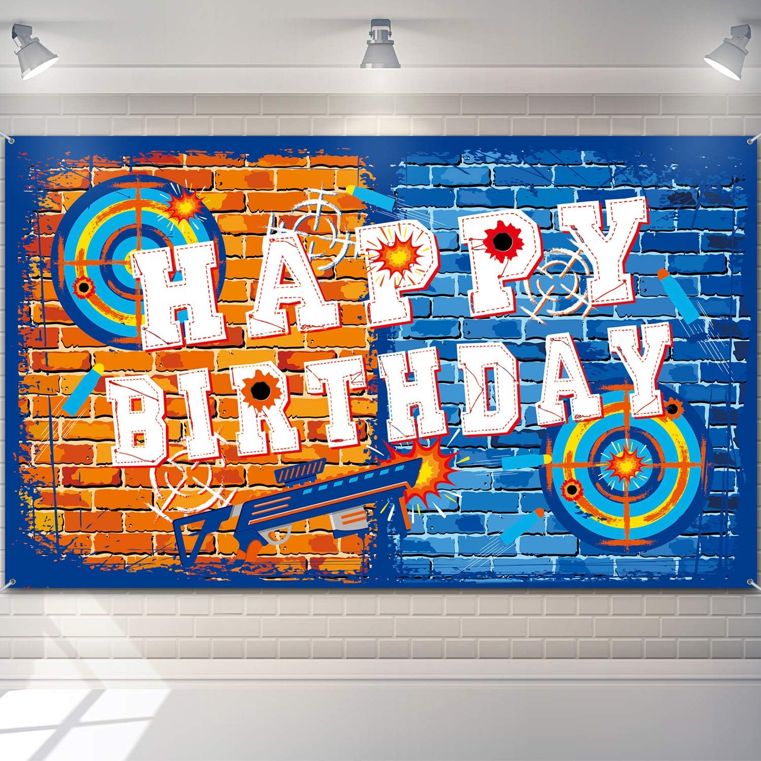 Happy Birthday backdrop with target rings and a blaster on blue and orange brick